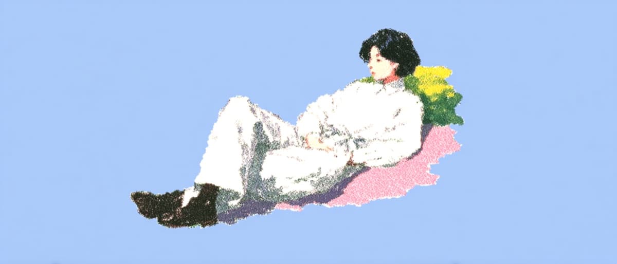 Person resting comfortably, suggesting relaxation or leisure.